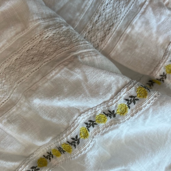 THE GREAT. The Clover Smocking Sleeveless Embroidered Floral Mid Dress - Picture 13 of 16